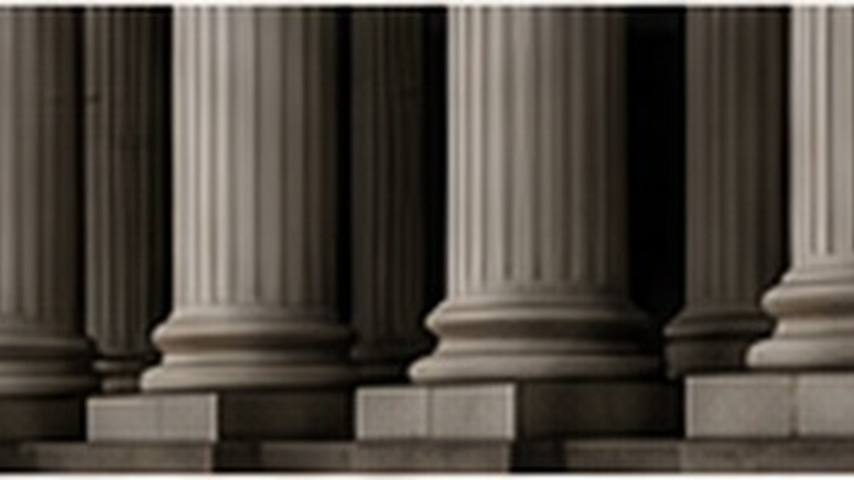 Editorial image of courthouse columns representing judicial review