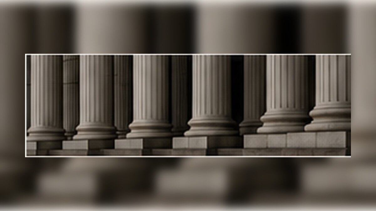 Editorial image of courthouse columns representing appellate review